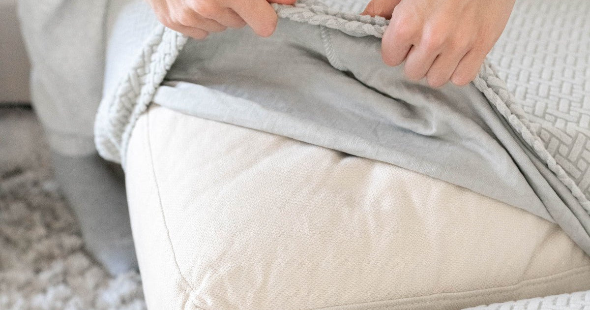 How to Keep Couch Covers in Place | Nolan Interior
