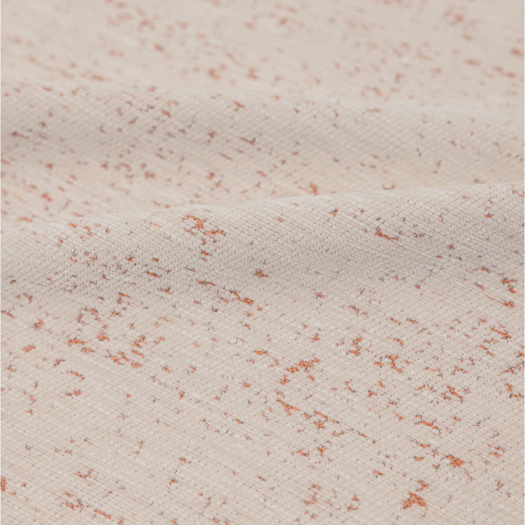 Close-up of the Cinnamon Iris Sprinkle Magic Sofa Blanket fabric with orange flecks