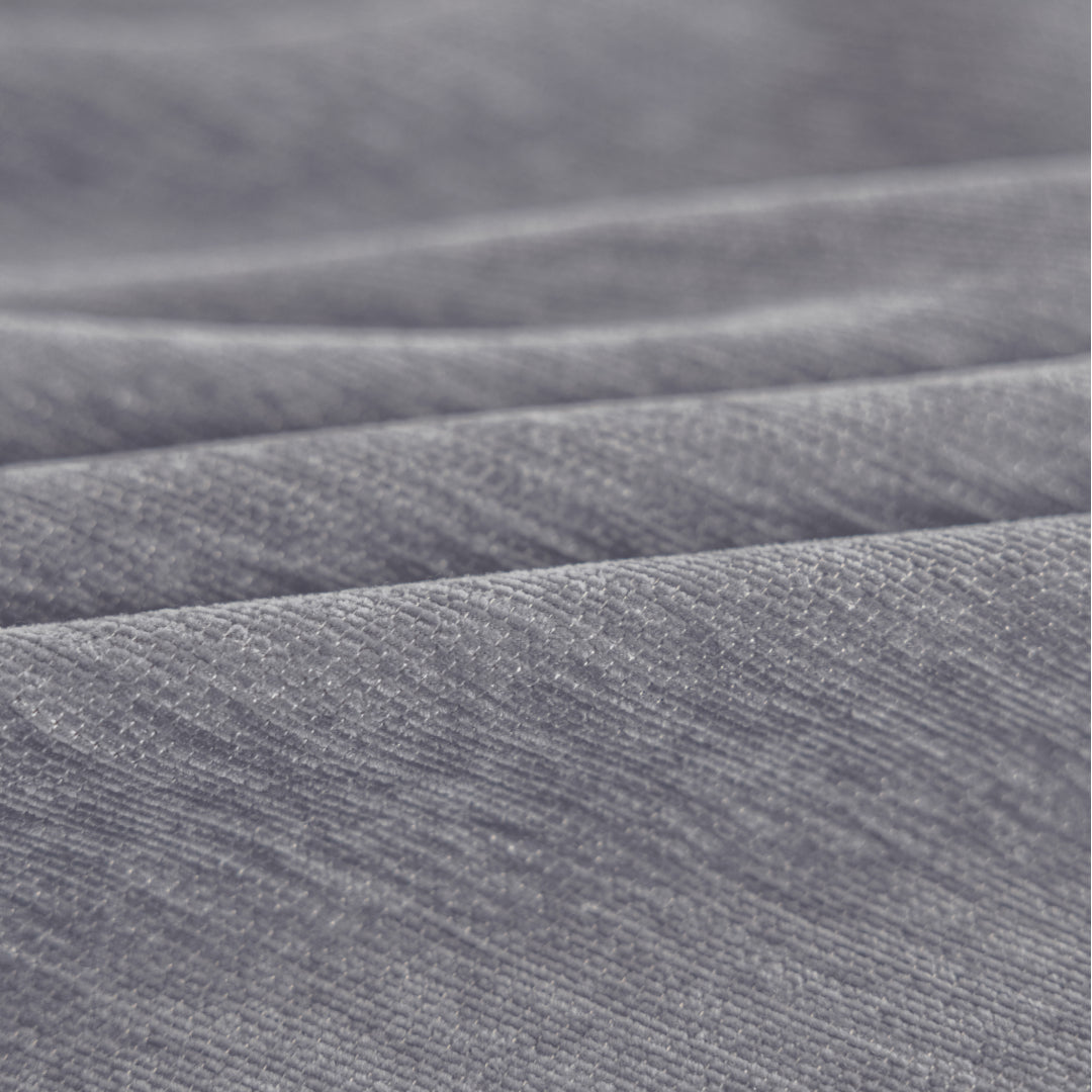 Close-up of Caviar Sophie Plush Magic Sofa Blanket fabric showing its ribbed chenille texture