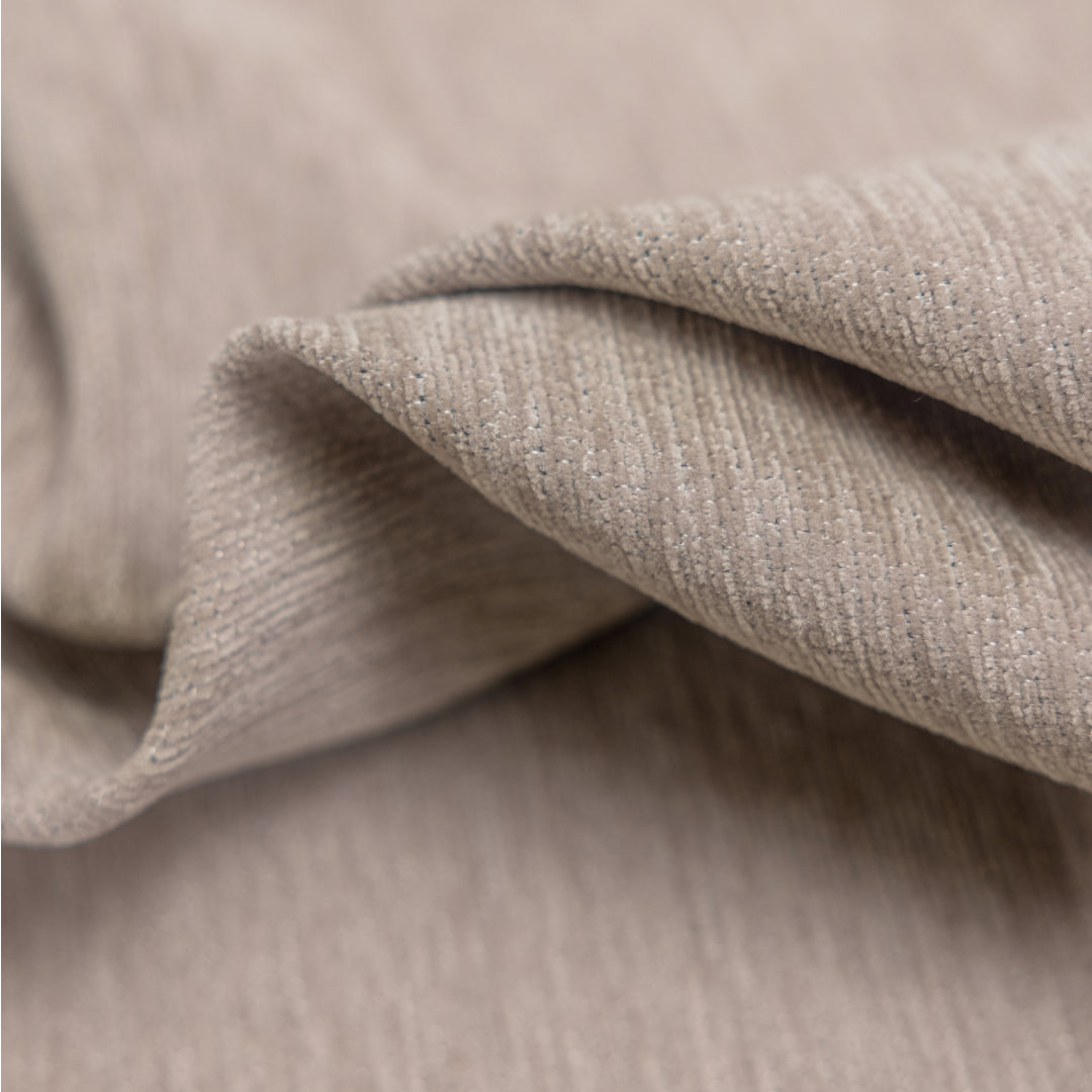 Close-up of Cookie Sophie Plush Magic Sofa Blanket fabric showing its ribbed chenille texture