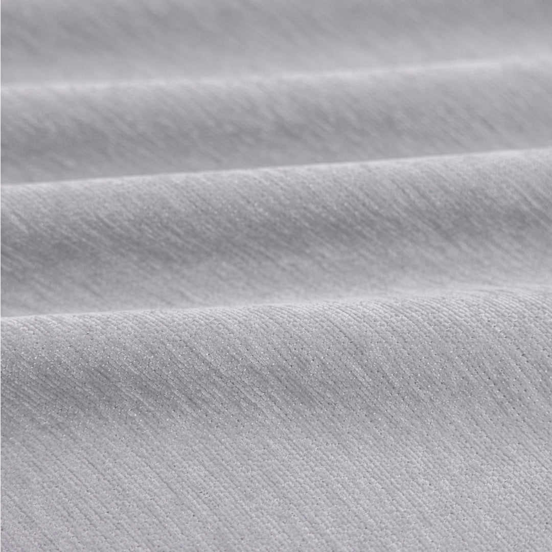 Close-up of Sesame Sophie Plush Magic Sofa Blanket fabric showing its ribbed chenille texture