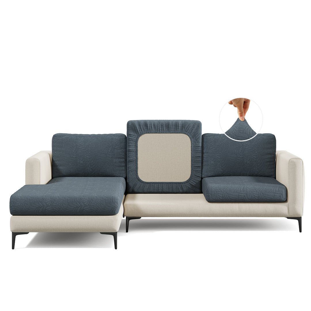 Leaf pattern Magic Sofa Cover in Charcoal Grey on a sectional sofa, white background
