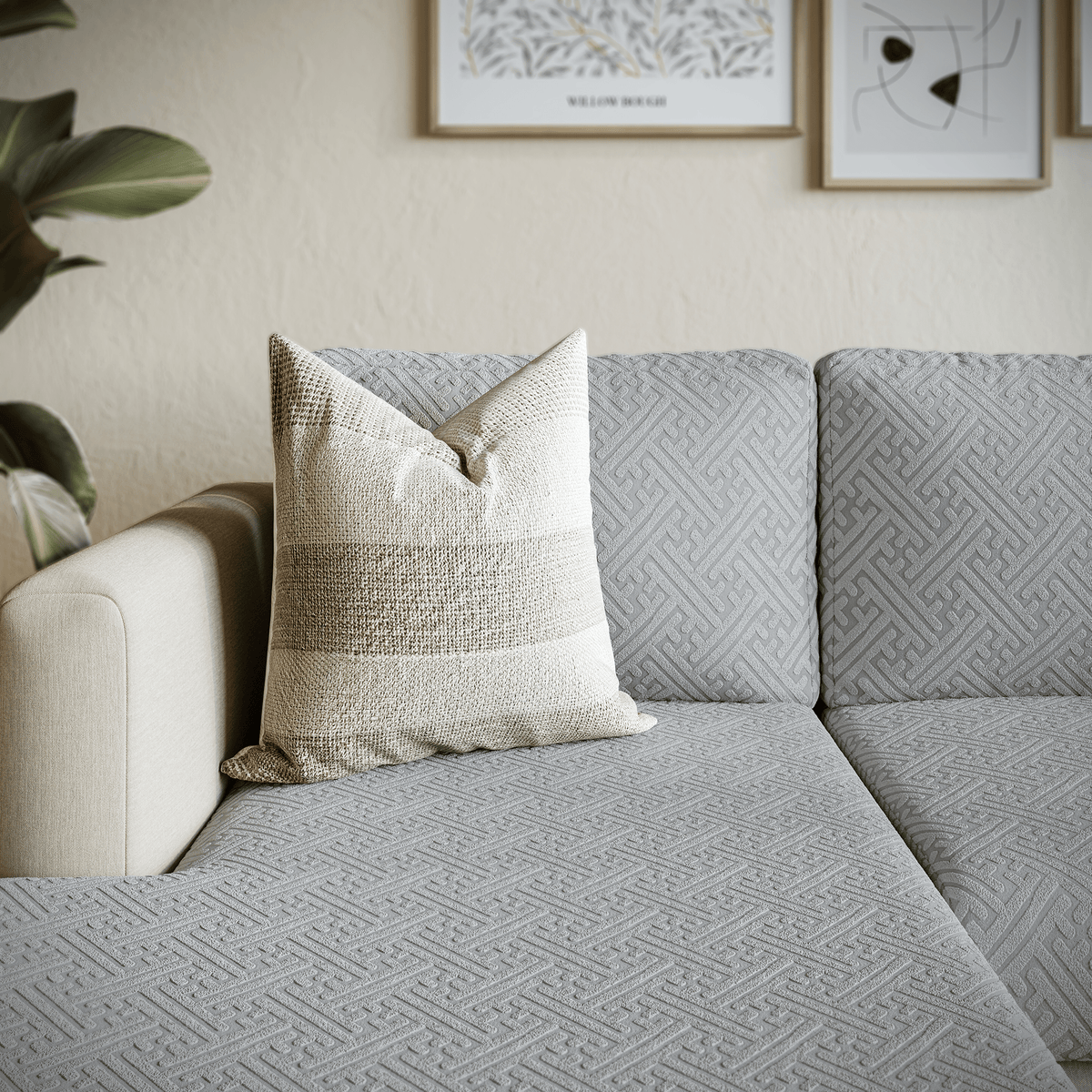Detail of a Maze pattern Magic Sofa Cover in Chrome Grey on a sofa cushion