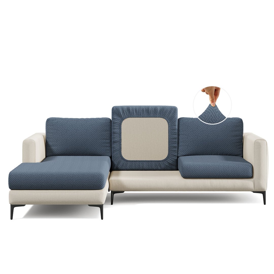 Maze pattern Magic Sofa Cover in Metal Grey on a sectional sofa, white background
