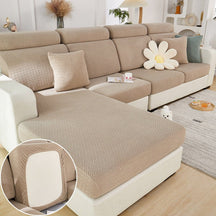 Brown sectional couch cover in a contemporary living room setting.