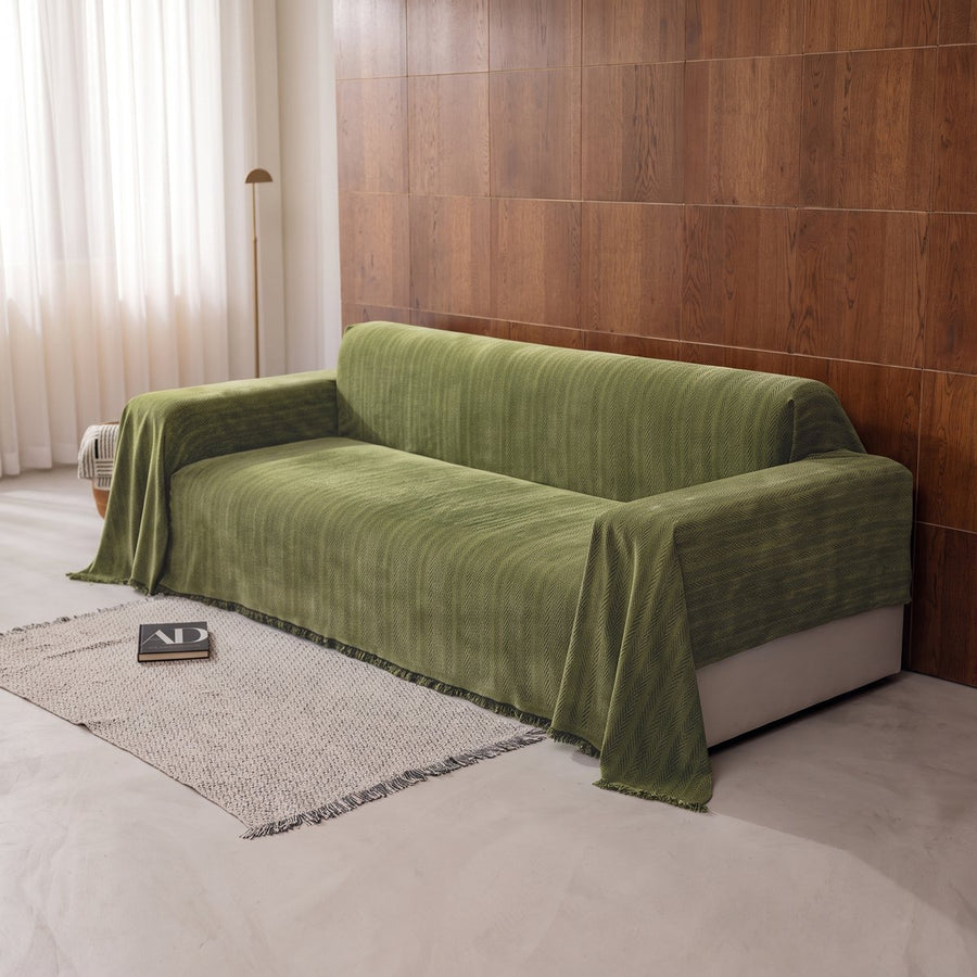 Caviar Lena Herring Magic Sofa Blanket draped over a whole sofa, front view