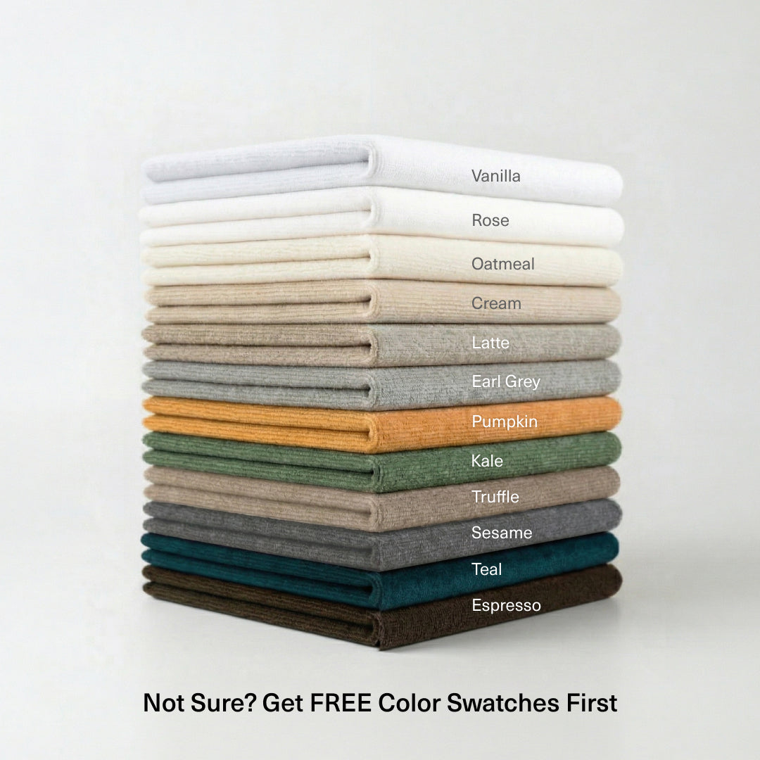 Folded Miracle Sofa Cover Plush fabric swatches in twelve colors, from Vanilla to Espresso