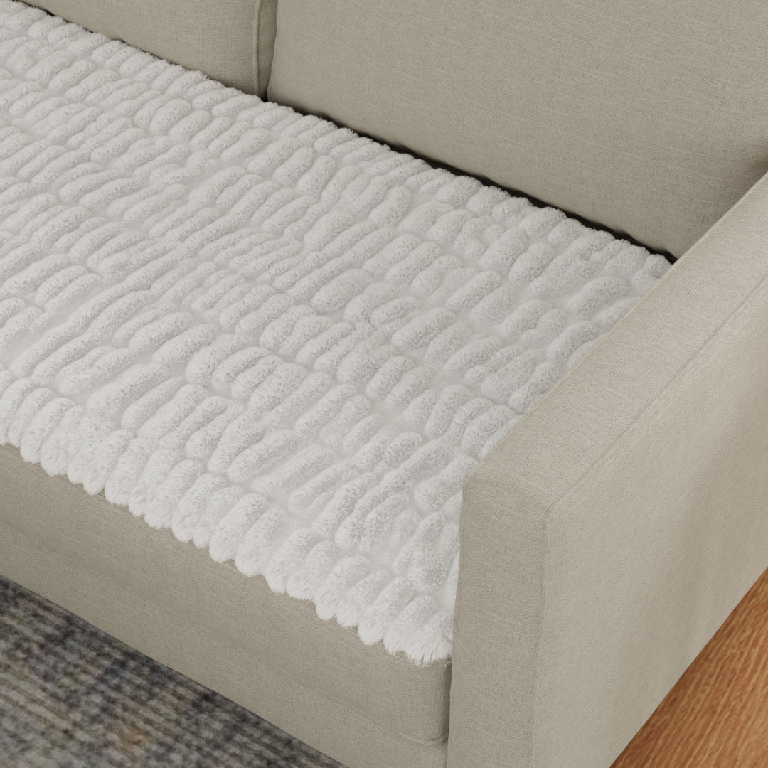 The mat edge on a sofa seat