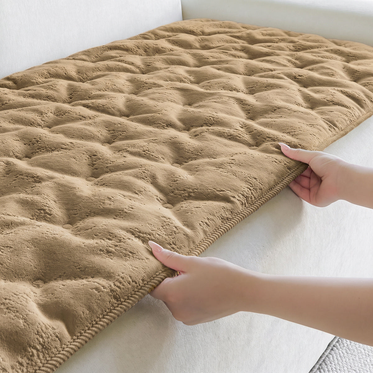 The mat edge on a sofa seat