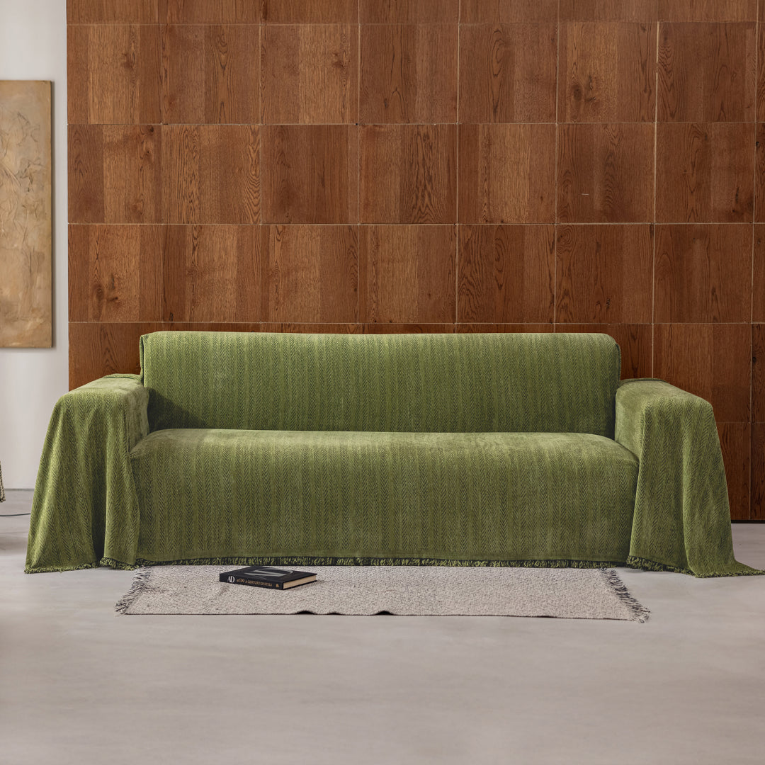 Kale Lena Herring Magic Sofa Blanket draped over a whole sofa, front view