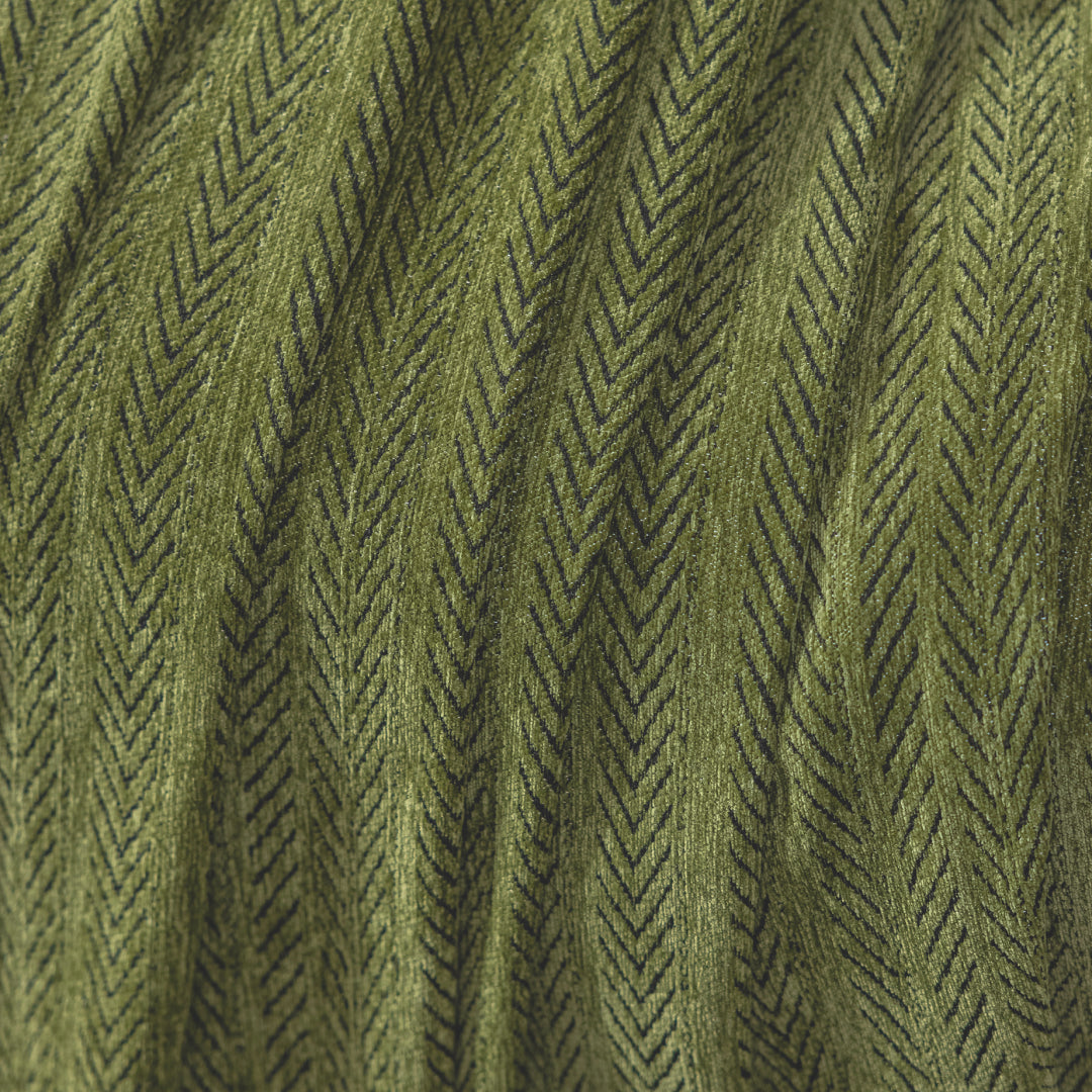Close-up of Kale Lena Herring Magic Sofa Blanket fabric showing the herringbone weave