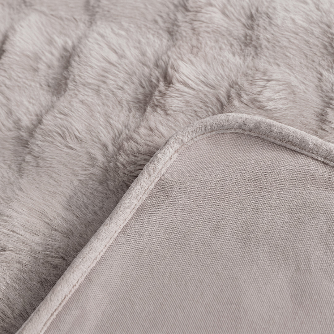 Backing of the Oat Milk Nora Mink Magic Sofa Blanket