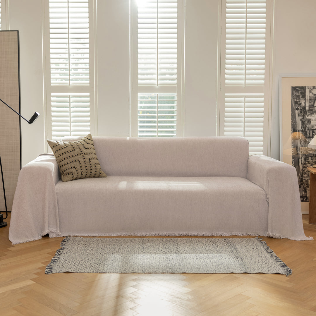 Cookie Sophie Plush Magic Sofa Blanket draped over a whole sofa