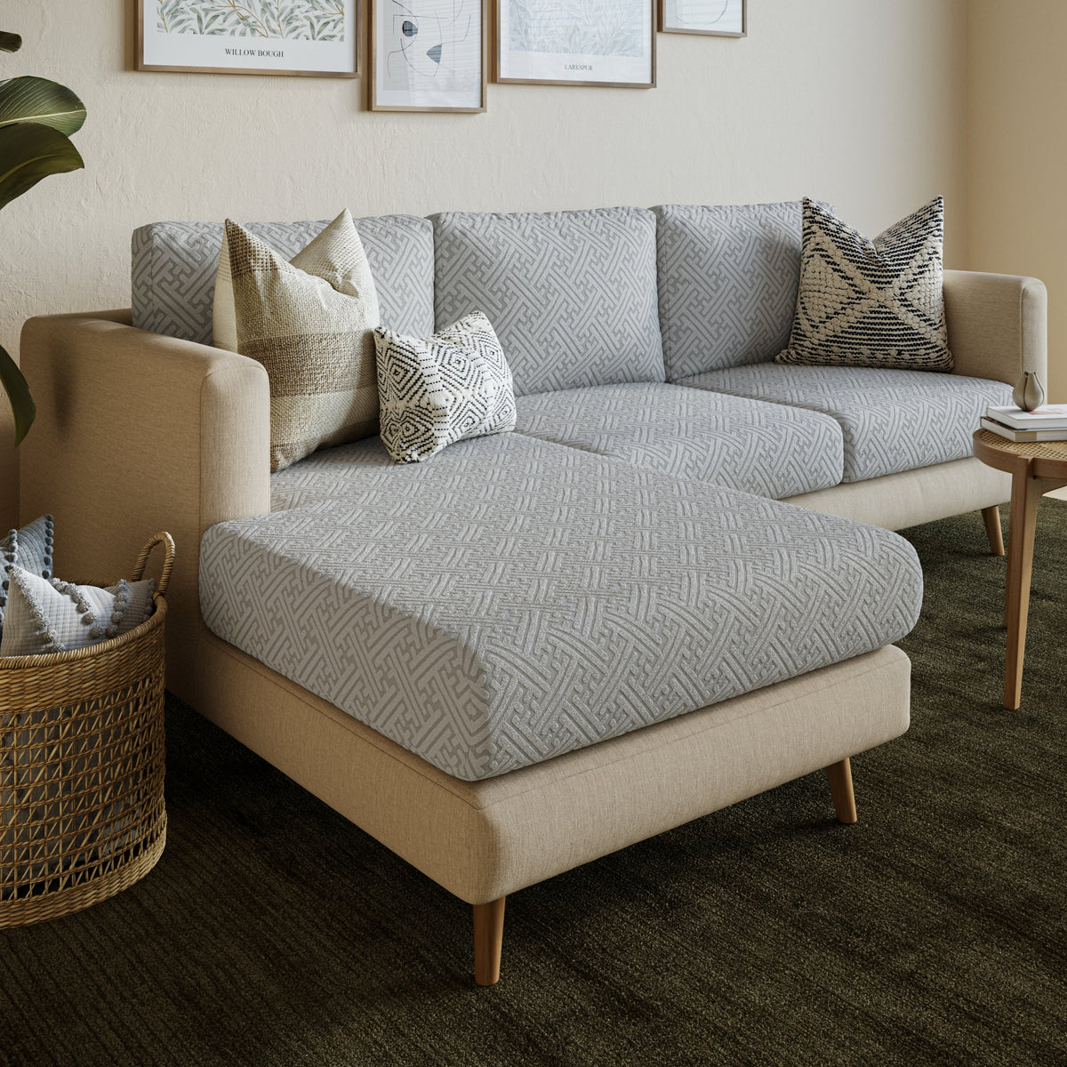Magic Sofa Cover in Maze pattern, light grey, on a beige chaise sectional in a living room