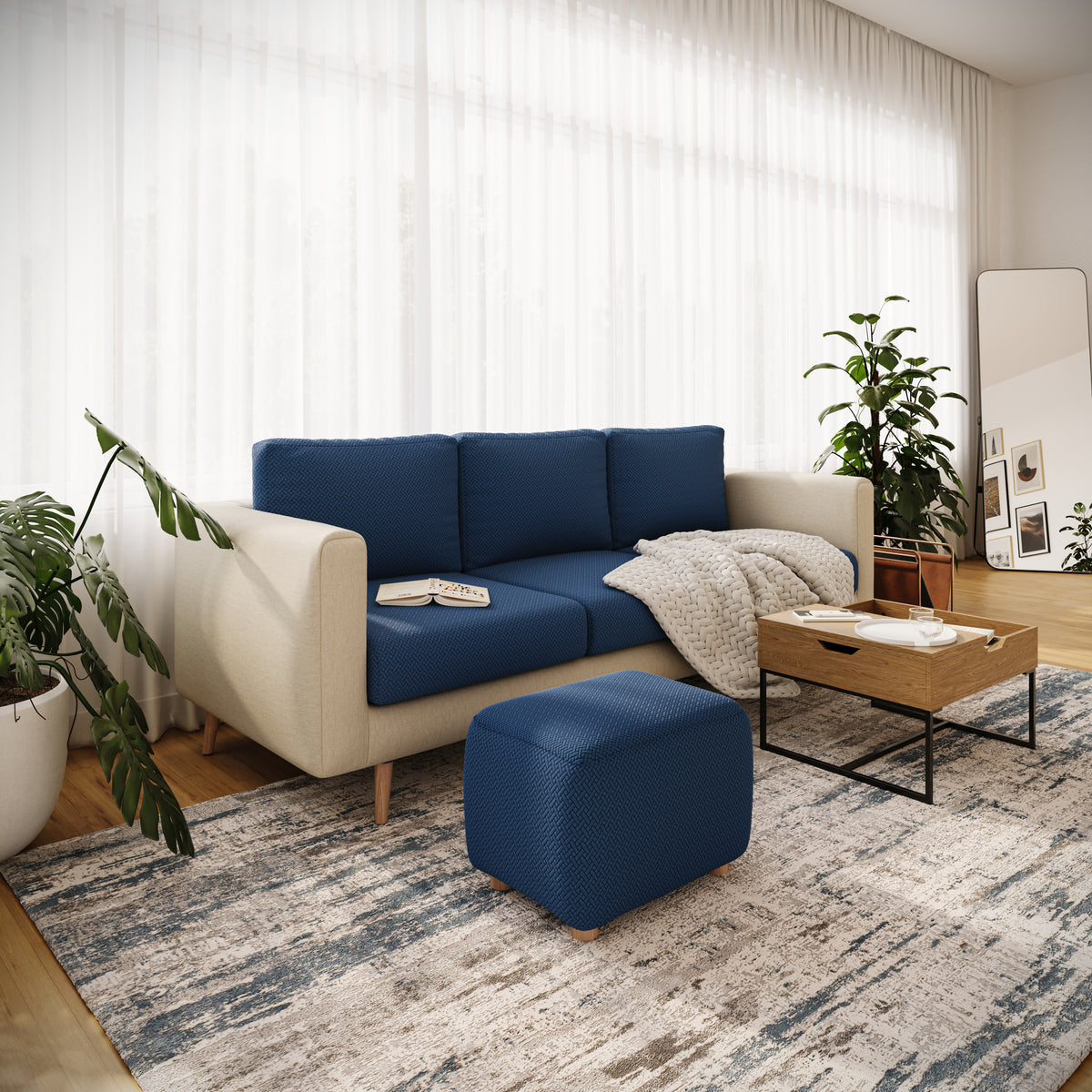Magic Ottoman Cover Classic in Navy Blue on an ottoman in a living room