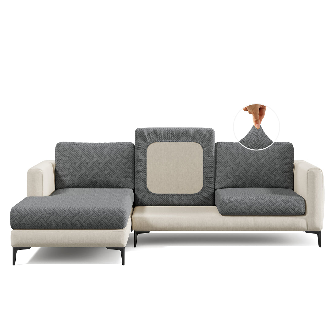 Maze pattern Magic Sofa Cover in Charcoal Grey on a sectional sofa, white background