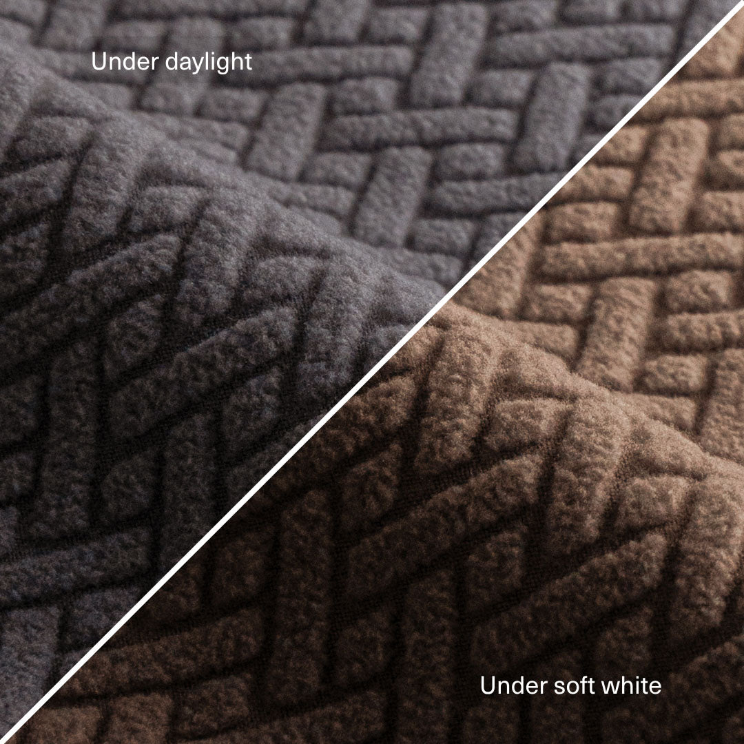 Classic pattern Magic Sofa Swatch fabric in Charcoal Grey, compared under daylight and soft white light