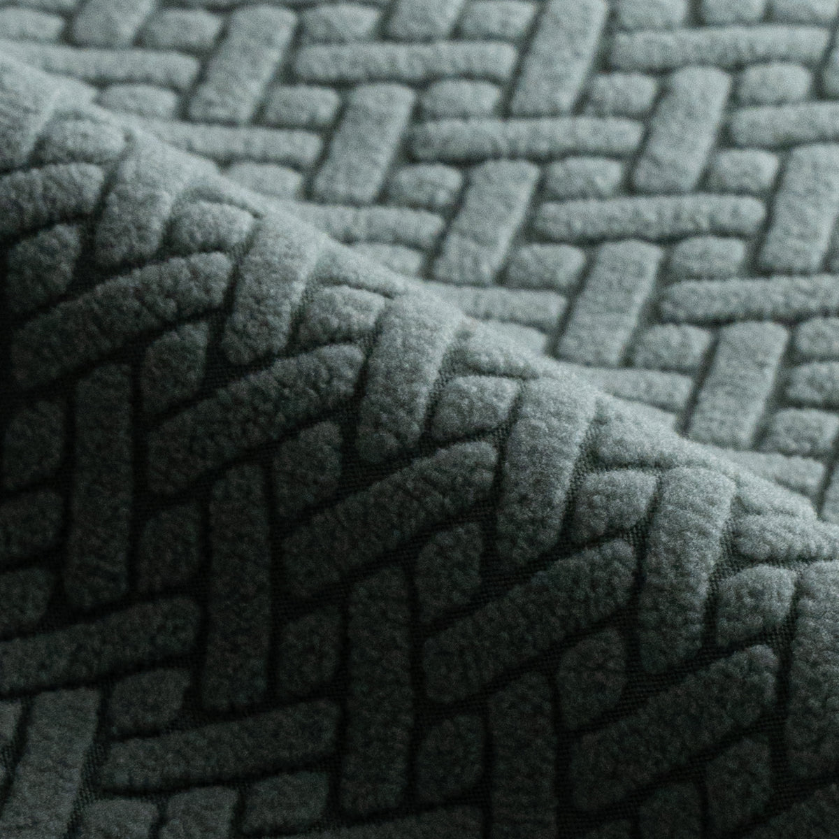 Close-up of draped Magic Sofa Swatch fabric in Classic pattern, Cypress Green