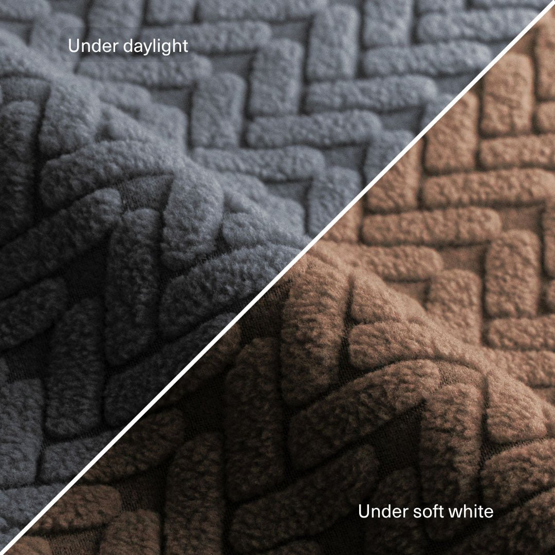 Wheat pattern fabric swatch in Charcoal Grey compared under daylight and under soft white light