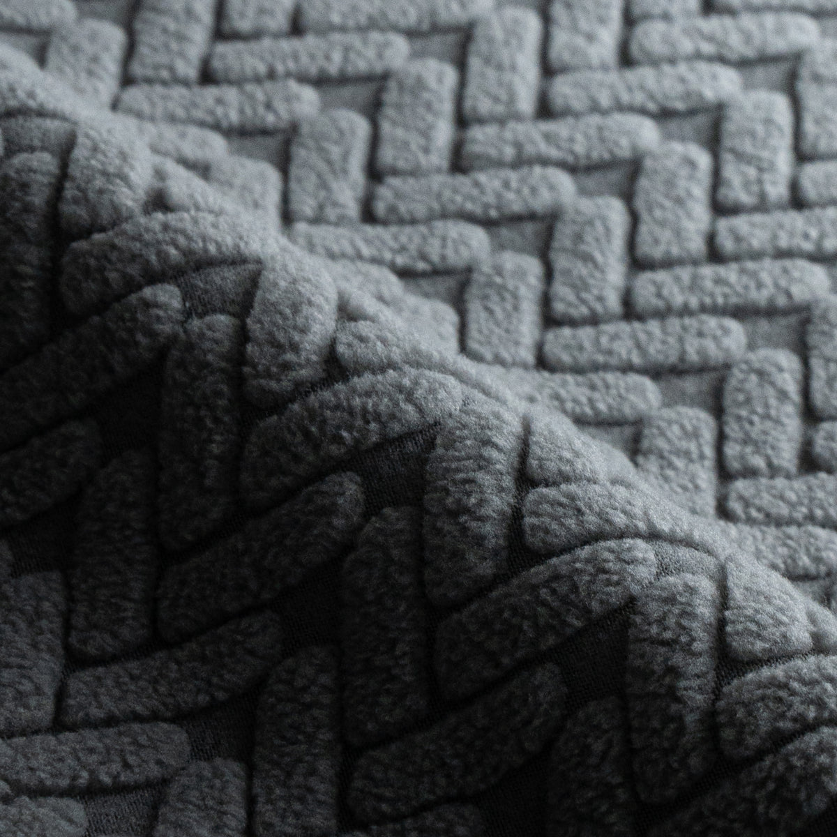 Close-up of folded Wheat pattern fabric swatch in Charcoal Grey