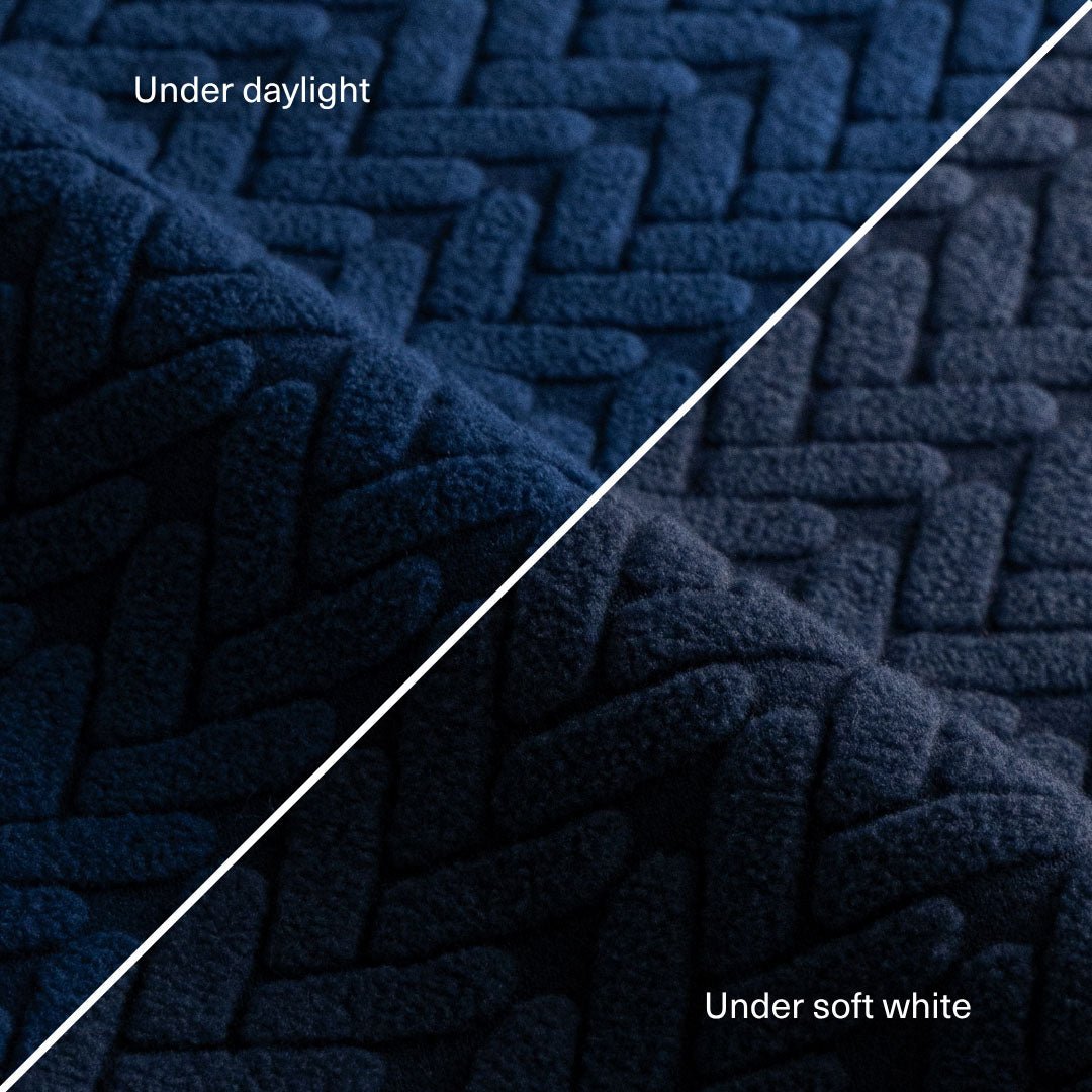 Wheat pattern fabric swatch in Navy Blue shown under daylight and soft white light