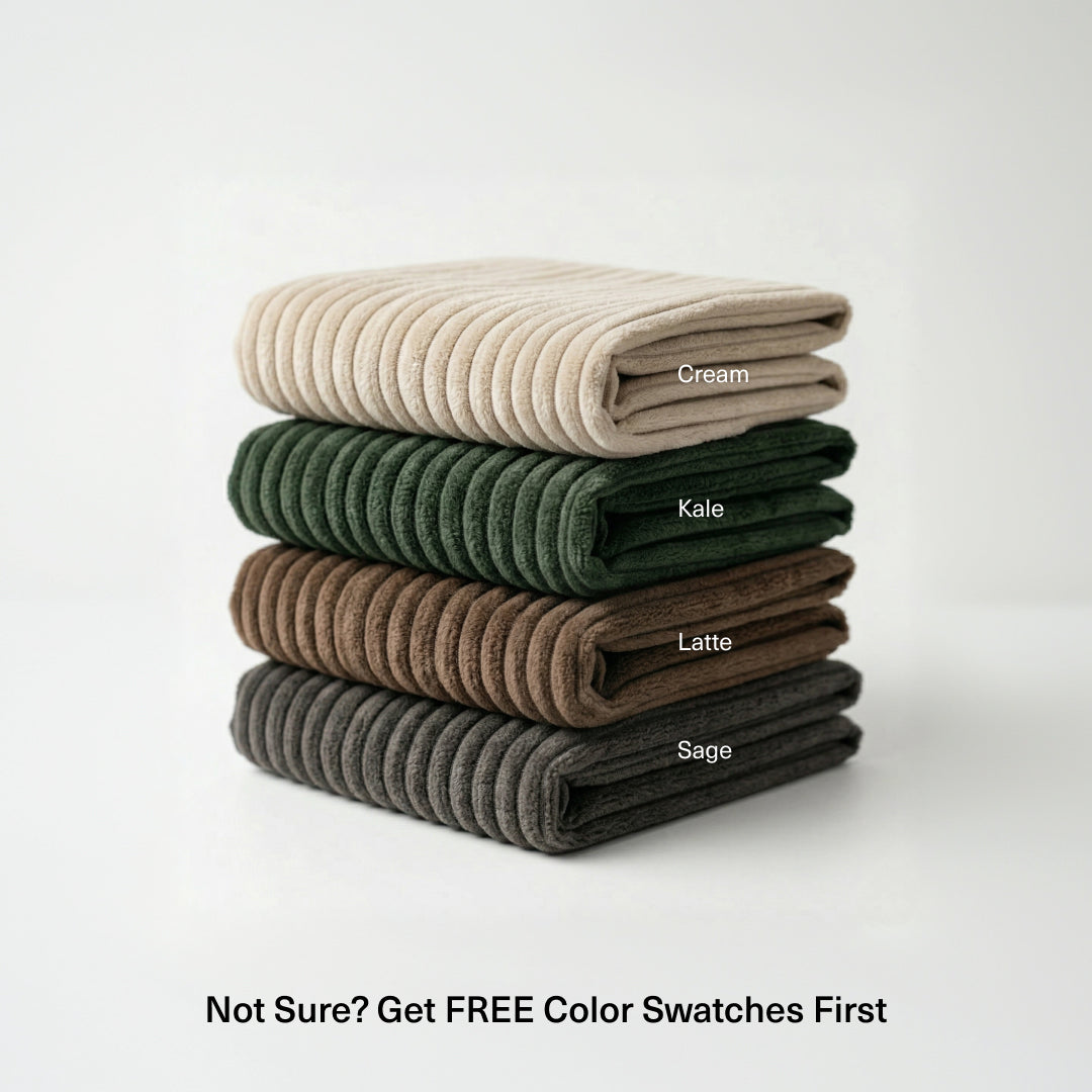 Folded Miracle Sofa Cover Corduroy fabric swatches in Cream, Kale, Latte and Sage