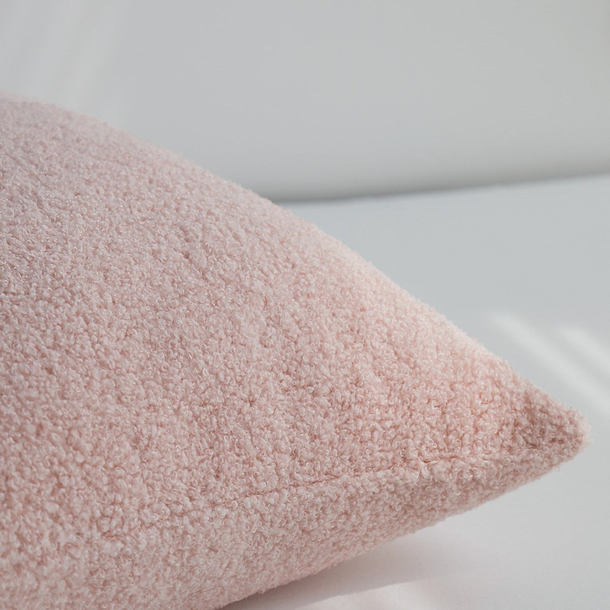Close-up of Teddy pillow cover fabric in Peony