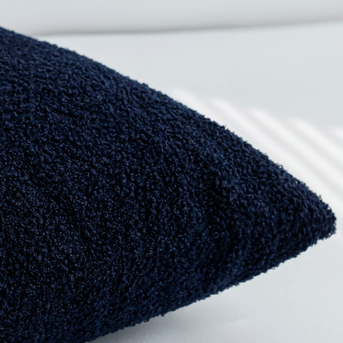 Close-up of Teddy pillow cover fabric in Navy