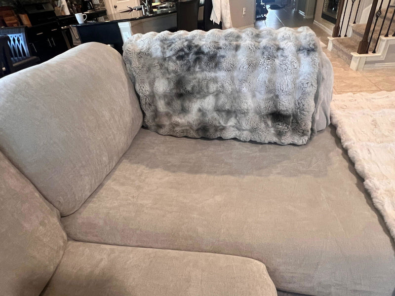 Customer's sofa blanket over a covered sectional