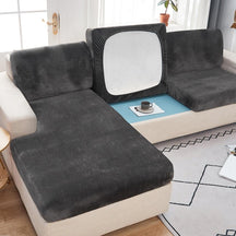 Dark grey modern couch cover in a contemporary living room setting.