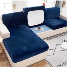 Dark blue modern couch cover in a contemporary living room setting.