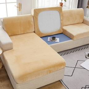Beige modern couch cover in a contemporary living room setting.