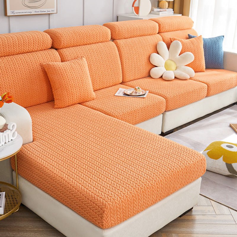 Orange dog couch cover in a contemporary living room setting.