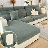 Green pet couch cover in a contemporary living room setting.