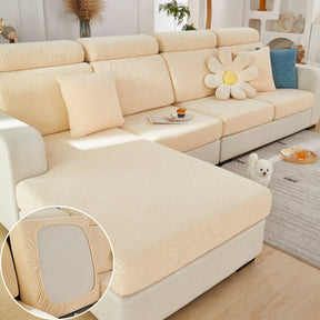 Beige pet couch cover in a contemporary living room setting.