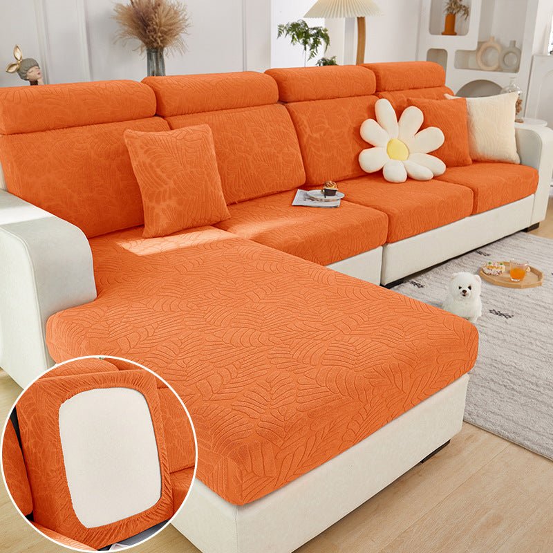 Orange pet couch cover in a contemporary living room setting.
